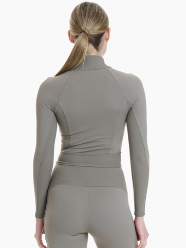 Long-sleeve sports top with half zipper and built-in bra with removable cups